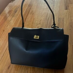 Black faux leather bag